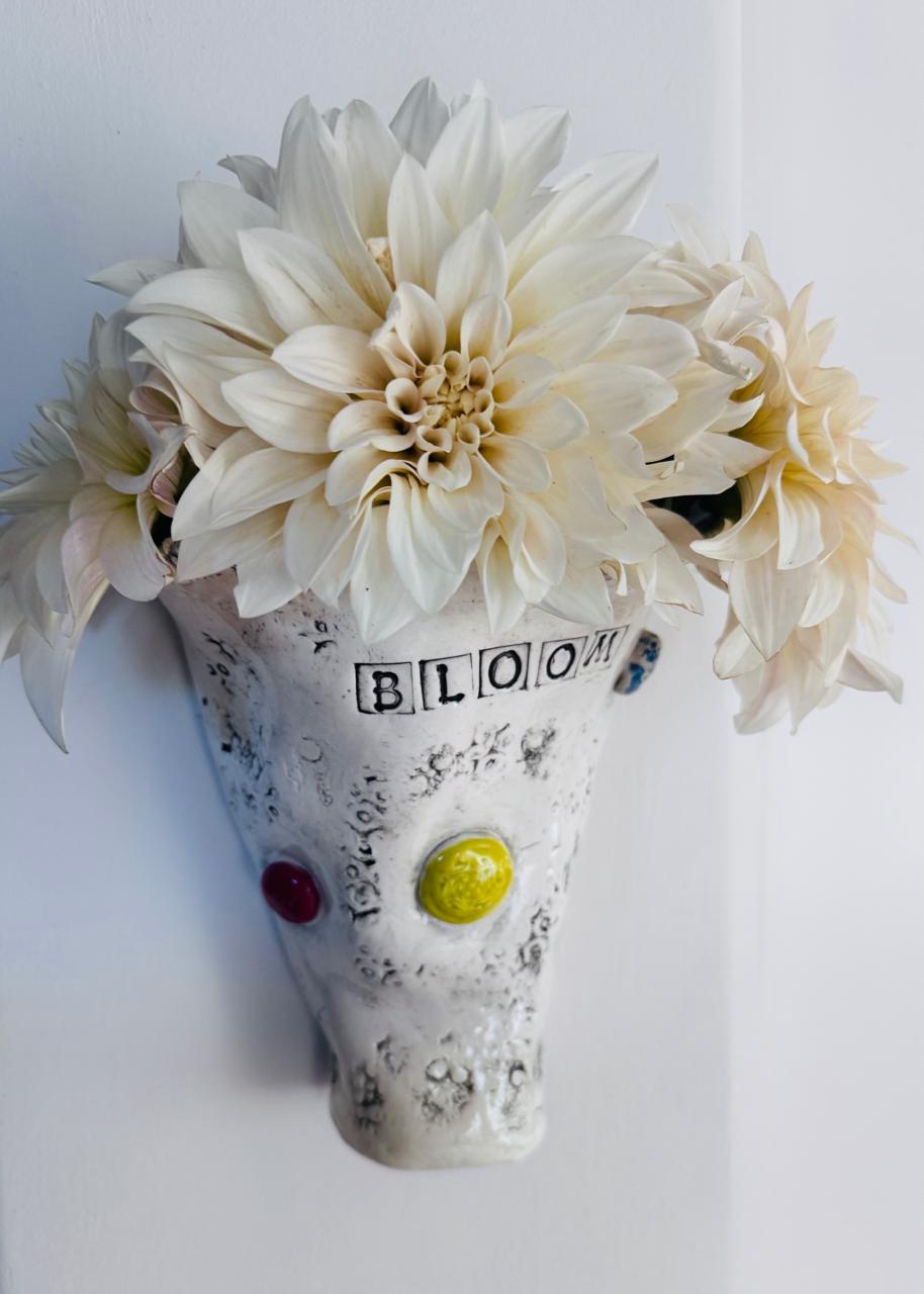 Karoo in the City wall vase with fresh flowers